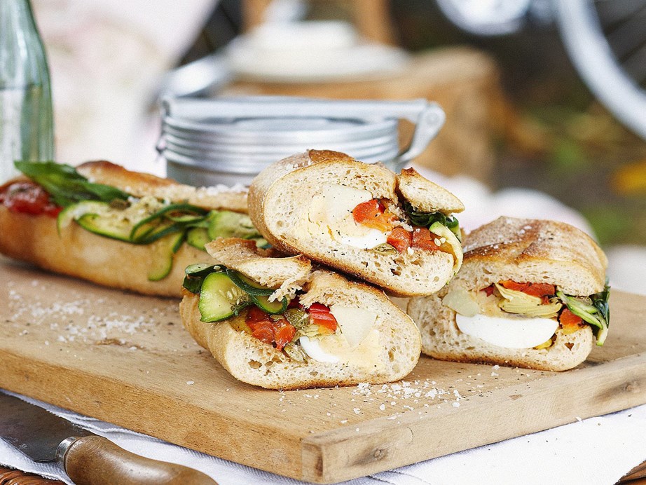 The [pan bagnat](https://www.womensweeklyfood.com.au/recipes/vegetable-pan-bagnat-17625|target="_blank") (pronounced with a French accent, more like "pahn bahn-yuh") is a classic sandwich from Nice (pronounced like "niece") and features many ingredients familiar to us from the popular [salad Niçoise](https://www.womensweeklyfood.com.au/recipes/salad-nicoise-4132|target="_blank").
