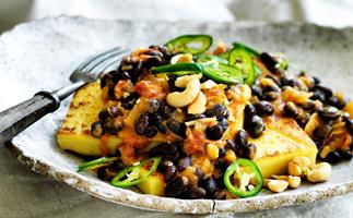 Chickpea ‘tofu’ with spiced black-eyed beans