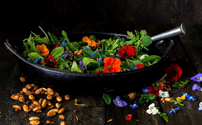 Leafy salad with spiced almonds & frida flowers