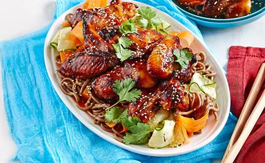 Sticky honey chicken wings with noodles