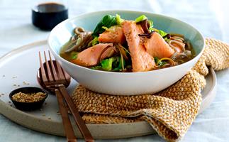 Salmon noodle soup with wild mushrooms, greens and toasted sesame