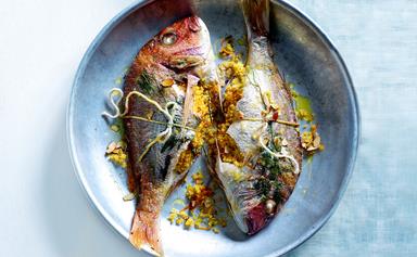 Tray-baked whole fish with citrus couscous stuffing