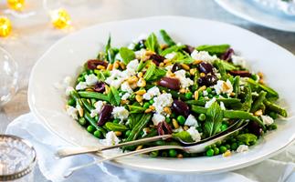 Green beans, peas with feta, olives and pine nuts