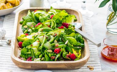 Green salad with shaved cucumber, peas, mint and raspberry dressing