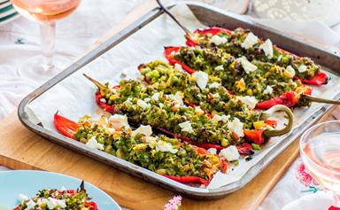 Roast peppers stuffed with peas, pine nuts and feta