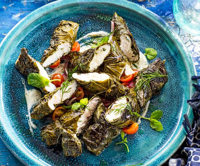 Fish fillets baked in vine leaves with dill yoghurt sauce and fennel salad