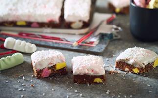 Chocolate lolly cake slice with gooey marshmallow frosting