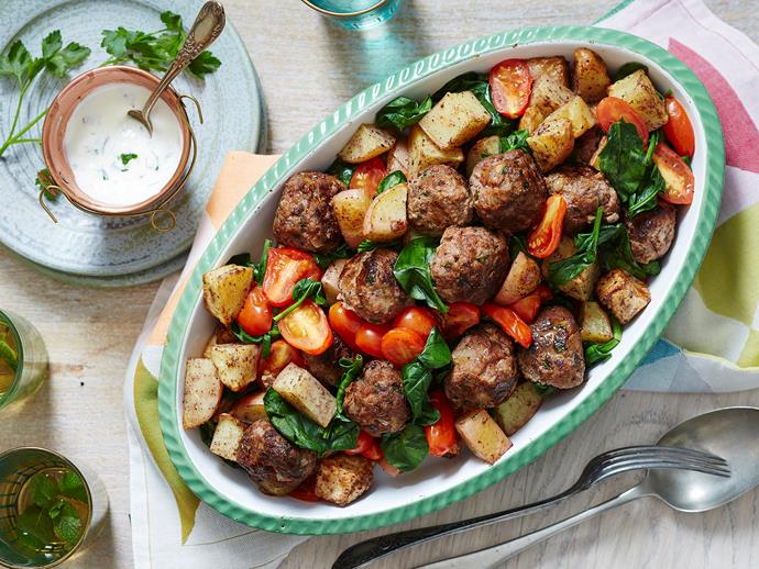 The kids will love tucking in to this delicious dish! With [sumac-spiced beef meatballs](https://www.womensweeklyfood.com.au/recipes/sumac-meatballs-and-potatoes-with-garlic-yoghurt-2578|target="_blank"), chunky potato pieces and a garlicky Middle Eastern yoghurt sauce, it's the ideal dinner for the family.