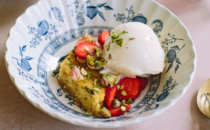Honey almond cake with pistachios, strawberries and hibiscus rose syrup