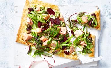 Salmon and beetroot tart with broad bean and pea topping