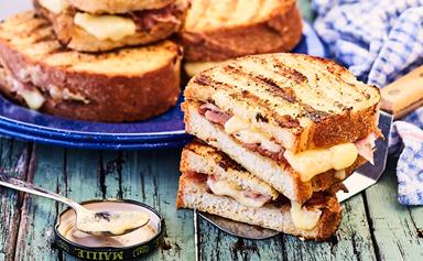 Grilled French toasted sandwiches with mustard, ham and gruyère cheese