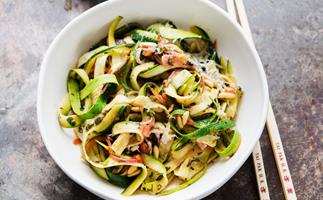 Courgette noodles with a warm pine nut and herb dressing