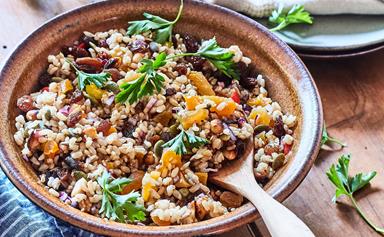 Healthy brown rice salad with sultanas, seeds and nuts