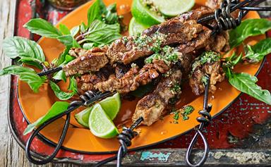 Grilled pork skewers with coriander and lime dipping sauce