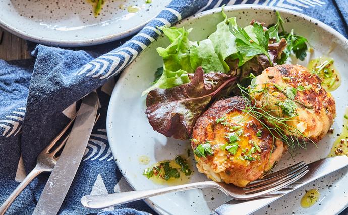 Hot smoked salmon and potato cakes with herby dressing