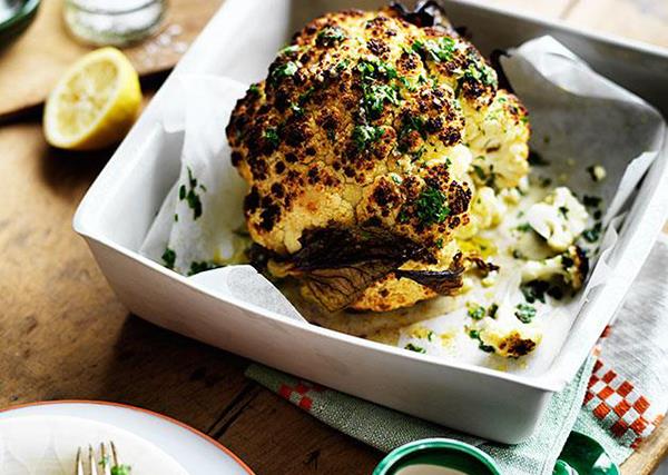 Whole roast cauliflower with parsley and anchovy sauce