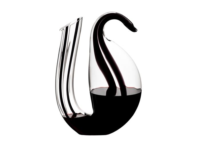 **Riedel Ayam Magnum Black Decanter:** An impressive marriage of form and function, the double-decanting design of this carafe allows you to pour the perfect glass every time. With only 500 available worldwide, this statement piece is the perfect gift for someone wanting to serve only the finest of wines. 
<br><br>
$1,000.01, [Riedel](https://www.riedel.com/en-au/shop/decanter/ayam-magnum-black-limited-edition-201700080|target="_blank"|rel="nofollow")