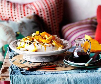 [**Golden pavlova with mango yoghurt and tropical fruits**](https://www.gourmettraveller.com.au/recipes/browse-all/golden-pavlova-with-mango-yoghurt-and-tropical-fruits-10922|target="_blank")
