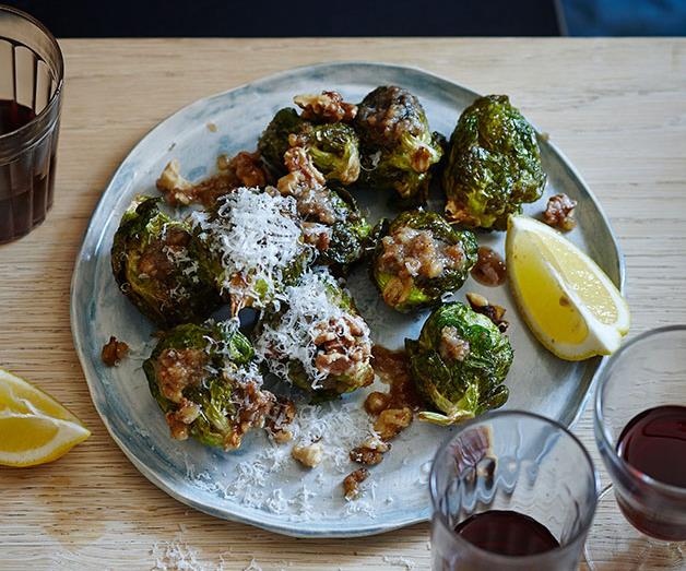 Brussels sprouts with walnut dressing, lemon and pecorino