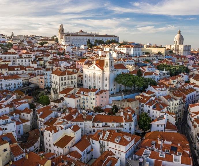 *A panoramic view over the historic district of Alfama in Lisbon, Portugal.*