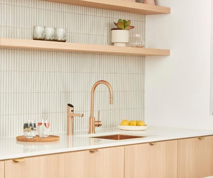 Zip HydroTap Elite Plus and Arc mixer tap in brushed rose gold brings elegance to this Scandi-style kitchen space.