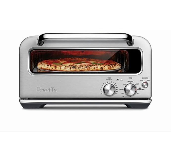 **[Breville The Smart Oven Pizzaiolo, $999, The Good Guys](https://prf.hn/click/camref:1011ljkzk/pubref:gt/destination:https://www.thegoodguys.com.au/breville-the-smart-oven-pizzaiolo-bpz820bss|target="_blank"|rel="nofollow")**

If you're looking for a pizza oven to use indoors, the Smart Oven Pizzaiolo by Breville is one to consider. The oven replicates the three types of heat generated by a brick oven – conductive, radiant and convective – to produce authentic wood fired-style pizza in just two minutes. Plus, its Element iQ system replicates the ideal baking environment for thick crust, pan, thin and crispy, and frozen pizzas. 
<br><br>
**[SHOP NOW](https://prf.hn/click/camref:1011ljkzk/pubref:gt/destination:https://www.thegoodguys.com.au/breville-the-smart-oven-pizzaiolo-bpz820bss|target="_blank"|rel="nofollow")**