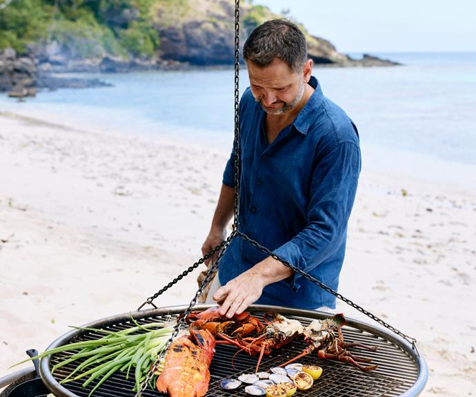 Lennox Hastie cooking freshly caught seafood over coals