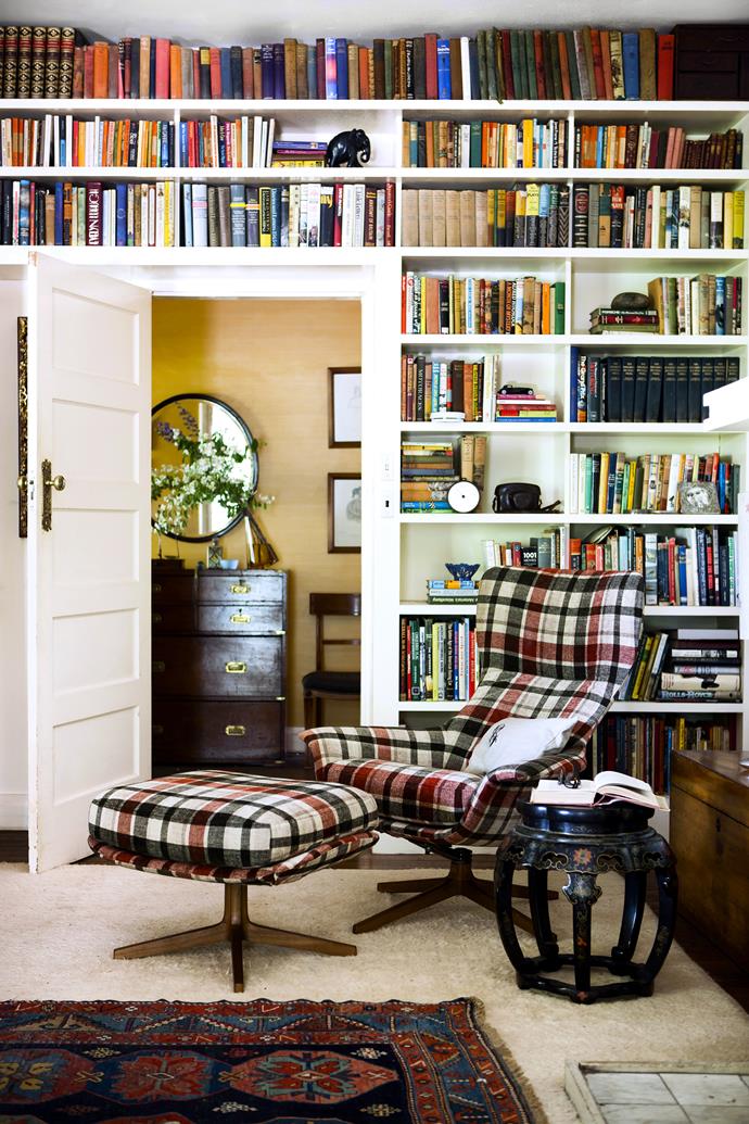 Charles designed the shelves in the library to store the collected books of three generations. 

The Seymour chair and ottoman, in a premium fabric, are his latest designs for [King Furniture](http://www.kingliving.com.au/|target="_blank"). Next to them is an antique Chinese table. In the hallway, a blown-glass vase by [Adam Goodrum](http://adamgoodrum.com/|target="_blank") sits atop a vintage campaign chest.