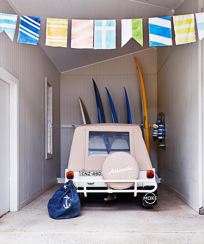 The Moke and paddle boards add that retro holiday feel; it is Byron Bay, after all. The colourful homemade bunting was inspired by the nautical flag alphabet.