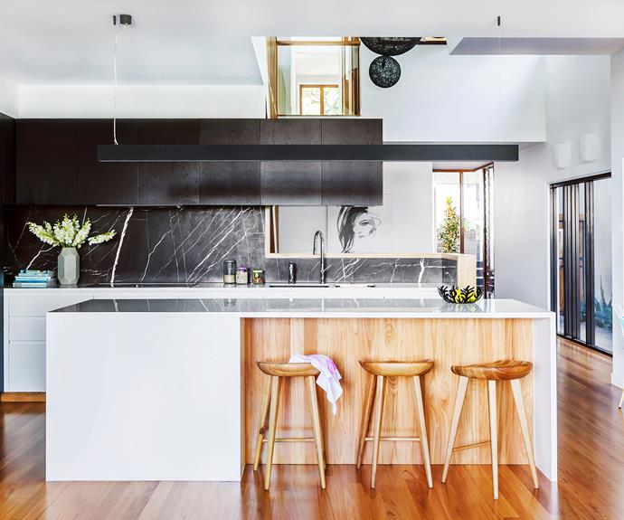 In the kitchen, blackbutt timber and richly veined stone add richness to a simple layout. 

**Joinery** by [GW & DC Wathen](http://www.wathen.com.au/contact|target="_blank"). [Corian](http://casf.com.au/|target="_blank") **benchtop** in Glacier White. **Splashback** in Pietra Grey marble from [Stone Galleria](http://stonegalleria.com.au/|target="_blank"). [Gaggenau](http://www.gaggenau.com/|target="_blank") **wall oven**. Modular **pendant light**, [Light & Design Group](http://ladgroup.com.au/|target="_blank"). Replica Tractor **stools**, [Sokol Designer Furniture](http://www.sokol.com.au/|target="_blank"). **Flowers** from [Phoebe Stephens Flowers](http://www.phoebestephensflowers.com.au/|target="_blank").