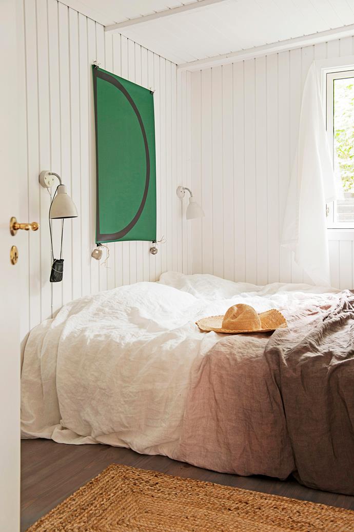 A subtle white and brown palette in the master bedroom encourages rest and relaxation. Cecilia made the ombre bedlinen out of Padua Cocoa fabric from [Designers Guild](https://www.designersguild.com/|target="_blank").