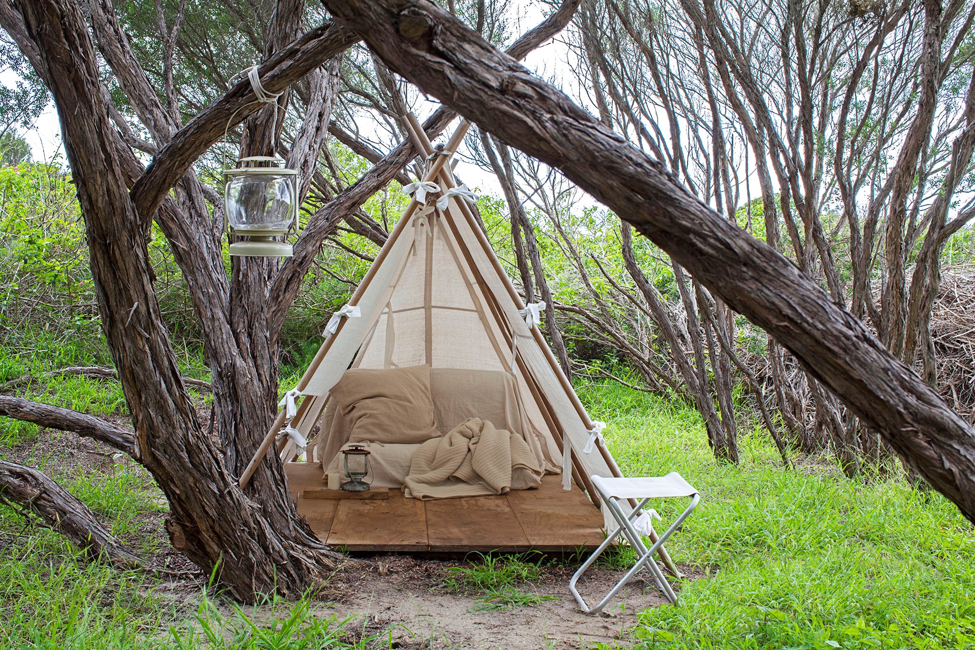 **Outside escape -** Whether it's a cosy day bed or a bit of garden [glamping](http://www.homestolove.com.au/the-best-aussie-glamping-spots-4567), create a holiday-vibe at home for the ultimate indulgence. Photo: Francoise Baudet