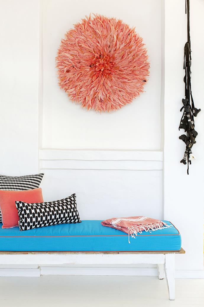 A Bamileke feather headdress from [Table Tonic](http://www.tabletonic.com.au/‎|target="_blank") adds a soft, whimsical feel to the sunroom.