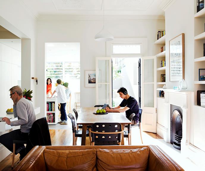The open-plan living and dining area and a cut-out through to the hallway are conducive to family interaction. 

Halifax Minni **dining chairs** from [FY2K](http://www.fy2k.com.au/|target="_blank").