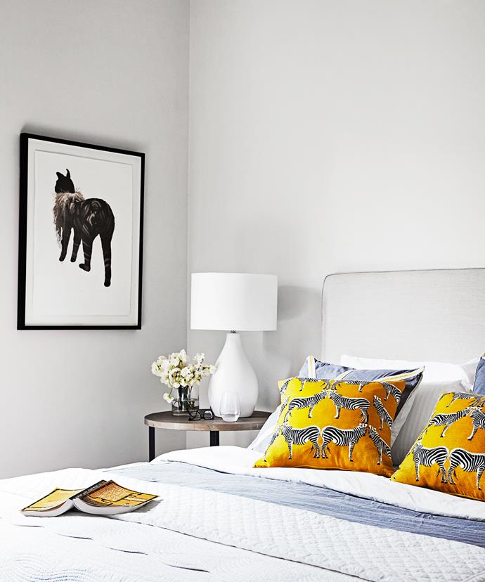 Animal themes reign supreme in the master bedroom. 

**Side table** and linen **bedhead** from [Town & Country Style](http://www.townandcountrystyle.com.au/?utm_campaign=supplier/|target="_blank"). Zebra **cushions** from [Dwell Studio](http://www.dwellstudio.com/?utm_campaign=supplier/|target="_blank").