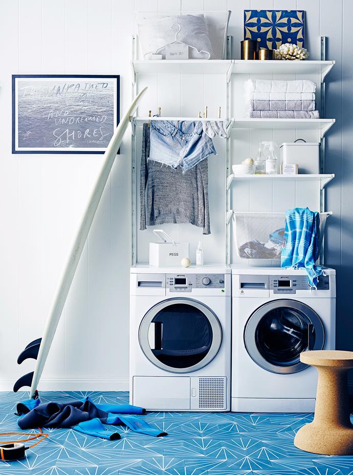 Ocean hues teamed with fresh white is the perfect scheme for a laundry. It's crisp, clean – and conducive to washing! 

Algot wall upright **shelving** system in White, and Algot **mesh basket**, both from [Ikea](http://www.ikea.com.au/|target="_blank"). Pushpin **side table/stool** from [The Minimalist](http://www.theminimalist.com.au/|target="_blank"). Xanthe plywood **tile** in Blue from [Bonnie And Neil](http://www.bonnieandneil.com.au/|target="_blank"). Shakespeare **print** in Silver Foil from [Blacklist](http://www.blackliststore.com.au/|target="_blank"). **ON FLOOR** Pikralida hexagon cement **tiles** in Blue from [Teranova](http://teranova.com.au/|target="_blank").