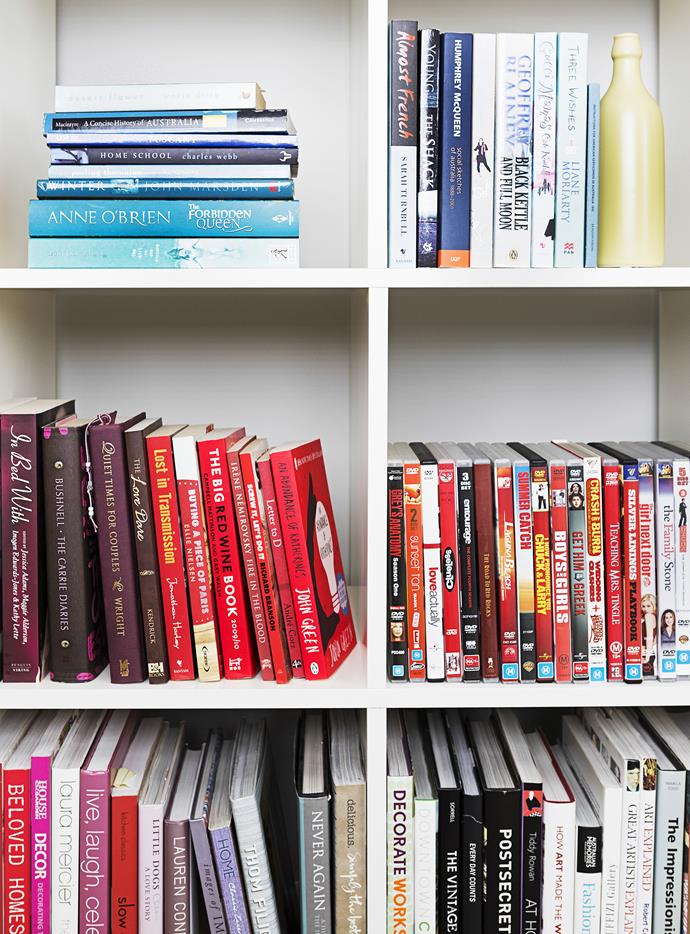 Colour-blocked books transform a white bookcase from simple to sensational.