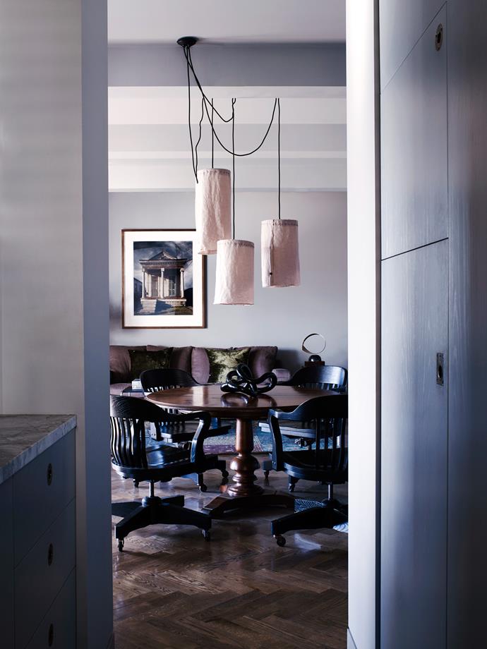 The pendant lights over the dining table were made by owner and artist Susan Weir.