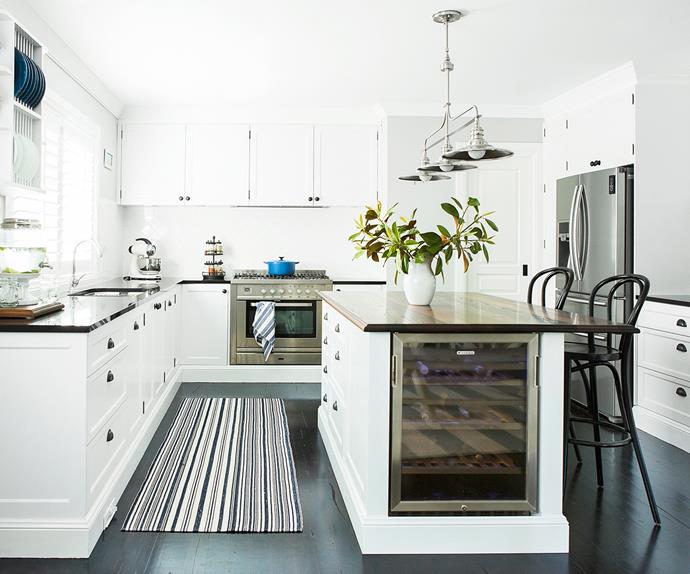 Hamptons-style white kitchen with wine fridge