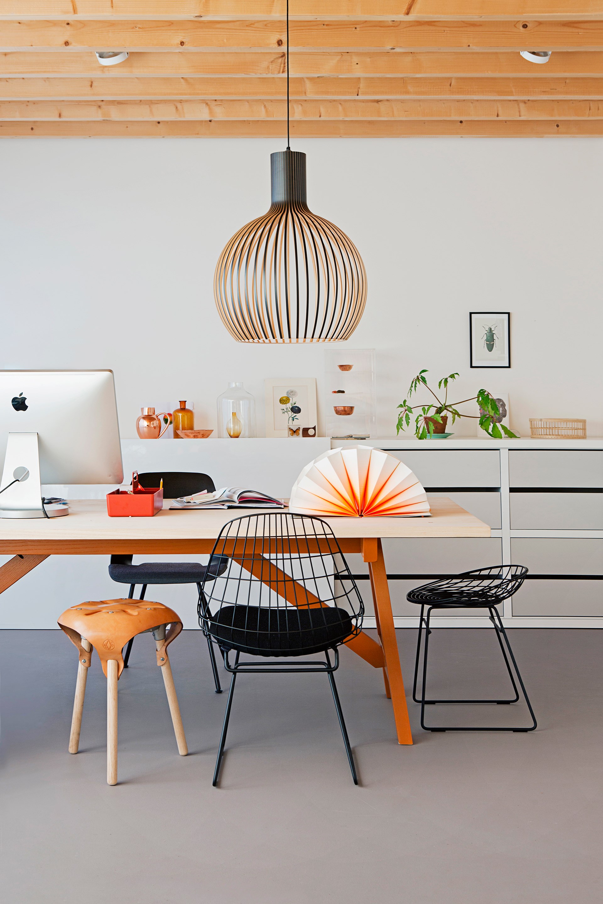 Thin strips of timber moulded into a bulbous shape form a beautifully sculptural light that makes a grand addition to this office space. Take a look around this [furniture designer's Dutch bungalow](http://www.homestolove.com.au/gallery-christiens-simply-beautiful-dutch-bungalow-2172|target="_blank"). Photo: Jeltje Janmaat @ House of Pictures / *real living*