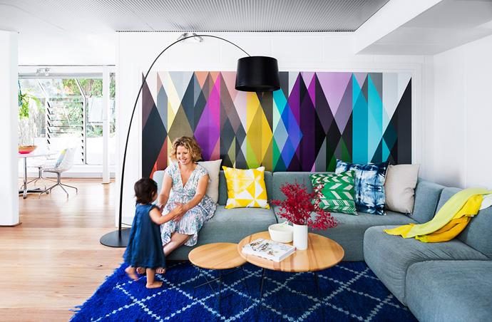 Owner Alex Speziali plays  with her daughter Autumn in this bright, uplifting space, under the original corrugated-aluminium ceiling. 

Milo **sofa** from [Jardan](http://www.jardan.com.au/?utm_campaign=supplier/|target="_blank"). **Coffee tables** and **floor lamp** from [Complete Pad](http://www.completepad.com.au/?utm_campaign=supplier/|target="_blank"). Yellow and green **cushions** and **throw** from [Koskela](http://www.koskela.com.au/?utm_campaign=supplier/|target="_blank").  Blue **cushion** from [Shibori](http://www.shibori.com.au/?utm_campaign=supplier/|target="_blank"). **Rug** from [Zouk](http://zoukliving.com/?utm_campaign=supplier/|target="_blank"). Cole & Son Circus  **wallpaper** from [Radford](http://radfordfurnishings.com/?utm_campaign=supplier/|target="_blank").