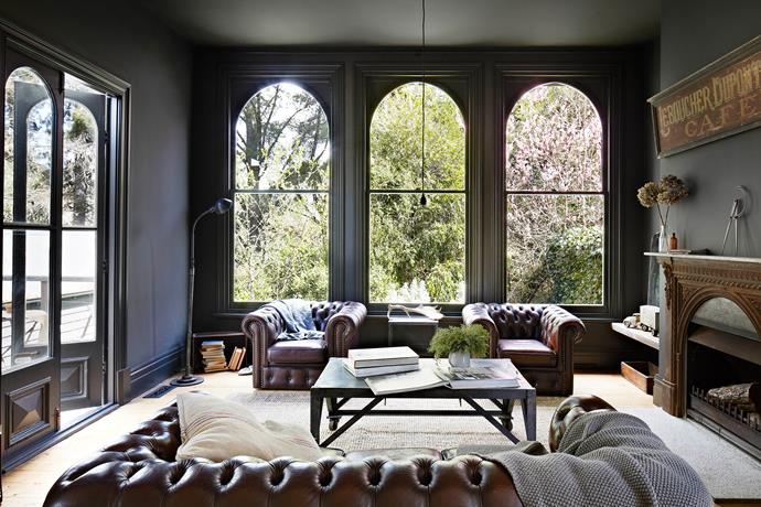 Vintage House Daylesford is full of amazing fossicked furniture. Who wouldn't want to sit in these leather chesterfield sofas and enjoy a glass of wine by the 1800's cast-iron fireplace from France? Photo: Armelle Habib | Styling: Julia Green