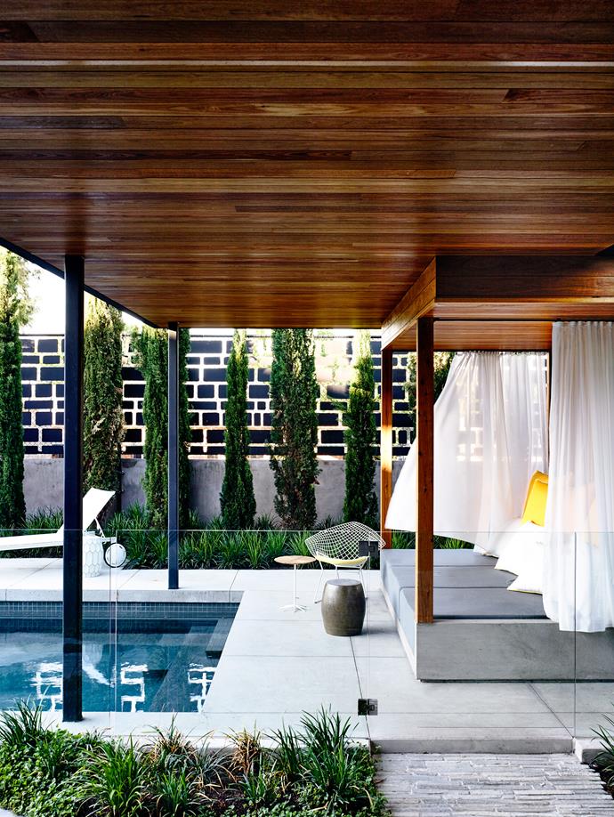 A cabana overlooks the backyard pool. Bertoia Diamond **chair** by [Knoll](http://www.knoll.com/|target="_blank"), Facettes **stool** by Fabienne Jouvin from [Meizai](http://www.meizai.com.au/|target="_blank"), Knoll **sunlounger** from [Dedece](http://www.dedece.com.au/|target="_blank").