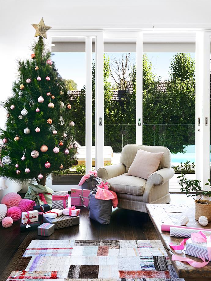 When it’s time to party, the McIntyre family opens up the glass sliding doors to extend the circulation space to the covered deck. Christmas tree **decorations**, all from [Vixen & Velvet](http://vixenandvelvet.com/?utm_campaign=supplier/|target="_blank").
