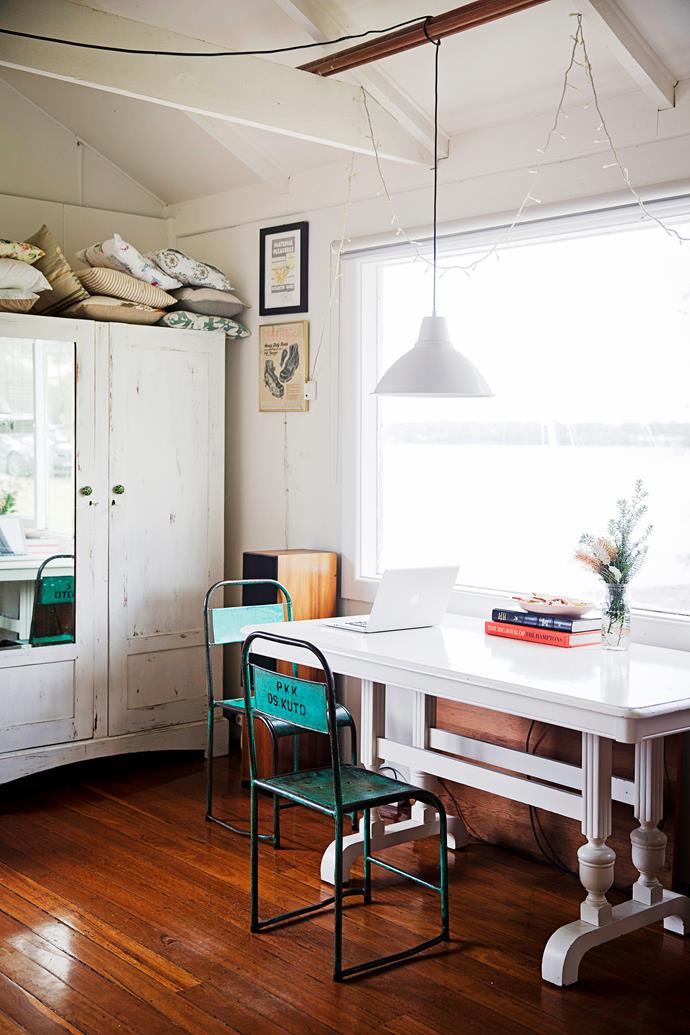 The white glass-top wicker table – another family heirloom – takes pride of place in the boatshed.