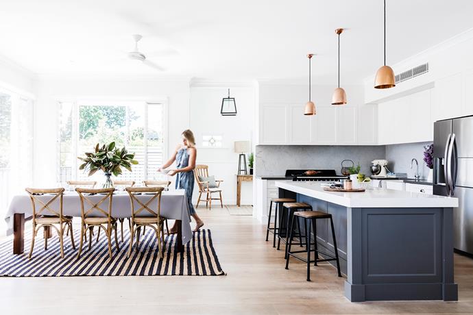 “I wanted a really big, inviting kitchen,” says homeowner Anna Williams (pictured). “It’s where we spend most of our time.” Quantum Quartz benchtops in Alpine White (island) and Tornado Grey. Carrara marble splashback, [WK Marble & Granite](http://www.wk.com.au/?utm_campaign=supplier/|target="_blank"). Copper pendant lights, [Dunlin](http://www.dunlin.com.au/?utm_campaign=supplier/|target="_blank"). Stools, [Oz Design Furniture](http://www.ozdesignfurniture.com.au/?utm_campaign=supplier/|target="_blank"). Dining chairs, [Alfresco Emporium](https://www.alfrescoemporium.com.au/?utm_campaign=supplier/|target="_blank"). Metal-framed pendant light (in hall), [La Maison](http://www.lamaison.net.au/?utm_campaign=supplier/|target="_blank"). Smart buy: Soho jute rug (1.6x2.3m), $420, [Madras Link](http://www.madraslink.com/clients/?utm_campaign=supplier/|target="_blank").