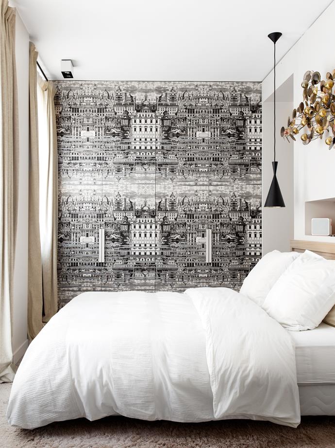 A modern 'Beat' pendant light by Tom Dixon lights up this savvy bedroom. Take a tour of the [Parisian abode](http://www.homestolove.com.au/a-design-savvy-duos-paris-abode-3244/?utm_campaign=supplier/|target="_blank"). Photo: