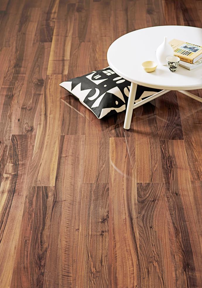 Laminate flooring in Queensland Walnut Supergloss, from $41.25 a square metre, from Formica Flooring.