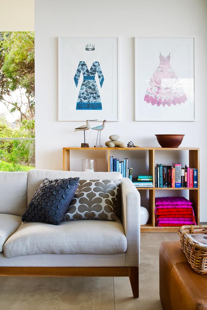 The color palette for this [contemporary coastal home](http://www.homestolove.com.au/contemporary-coastal-home-provides-the-ultimate-sanctuary-2794|target="_blank") is navy- to pick up on the ocean's views- with pockets of vibrant pink and tangerine working as natural complements.