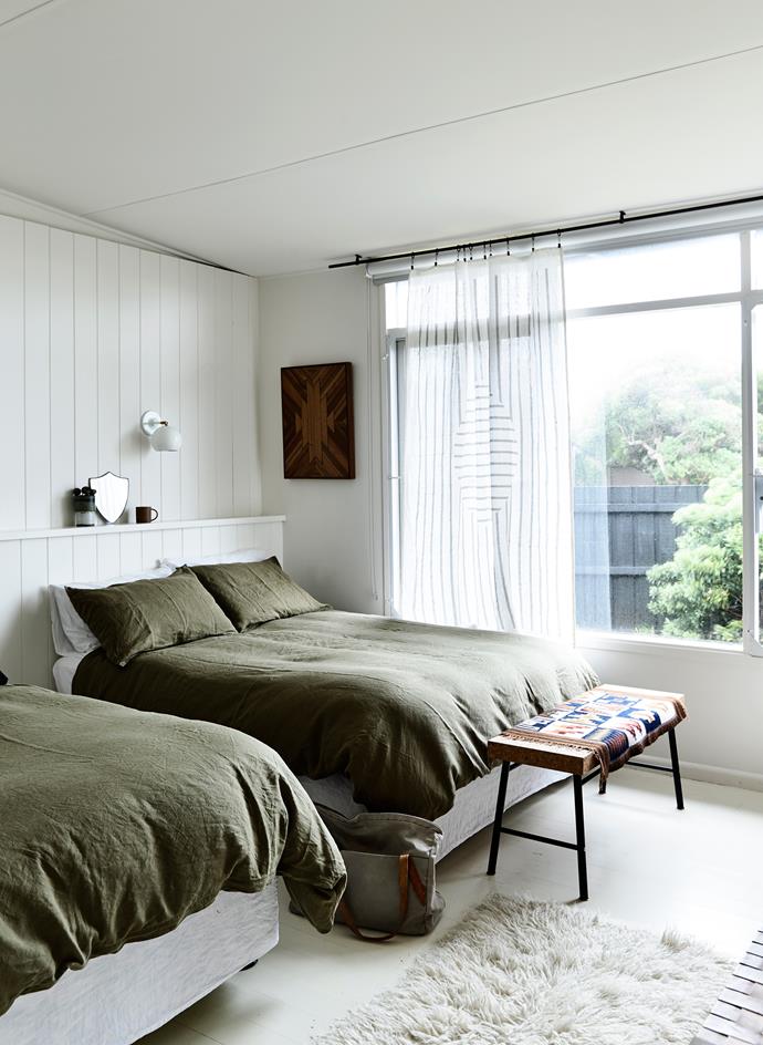 A guest bedroom features two double beds. The bench is from the ["Sinnerlig" Ikea range by Ilse Crawford](http://www.ikea.com/au/en/catalog/categories/collections/31586/|target="_blank"), which features throughout the home.